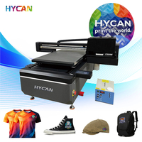 6090 3D TPU Patch UV Flatbed Printer 4 stuks I3200 voor wasbare jersey T-shirts, hoeden, tassen, denim, custom reliëf labels UV Flatbed Printer