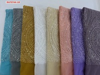 Tissu de dentelle de mariée en maille de tulle de broderie française perlée de haute qualité avec des paillettes pour des robes de mariée
