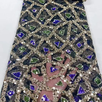 Tissu de luxe français en dentelle brodée extensible avec de grandes paillettes violettes et vertes et des perles pour robe
