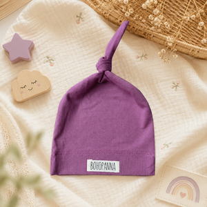 Gorro de bebé premium de tencel orquídea, confeccionado con tela suave y sedosa, transpirable y de ajuste flexible para cabezas pequeñas y delicadas. - Product Image 4
