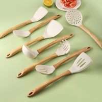 MANJIA Ensemble d'ustensiles de cuisine en silicone sans BPA résistant à la chaleur Ensemble d'ustensiles de cuisine avec spatules et poignées en bois