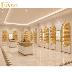 Design d'Interni di Lusso Moderno per Piccolo Negozio di Profumi negli Emirati Arabi Uniti, Vetrina Espositiva Personalizzata per Profumi in Oro Bianco - Product Image 1