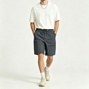 Shorts pour hommes personnalisés de haute qualité, taille mi-haute, ourlet brut, couleur unie, en toile, décontractés, respirants, avec poches, 100% coton - Product Image 1