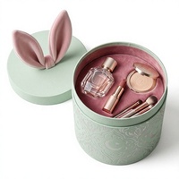 Boîte cadeau cylindrique en papier vert menthe avec oreilles de lapin, poignée en velours, emballage floral pour Pâques
