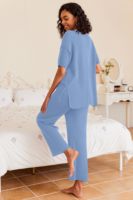 Tenues de voyage décontractées 2 pièces pour femmes ensemble de pull à motif solide ample avec pantalon à jambes larges pour l'été
