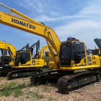 Excavadora de cadenas usada KOMATSU PC240LC con línea de martillos auxiliares completa y bajo mantenimiento para tareas de rompe roca ligera y limpieza de terrenos