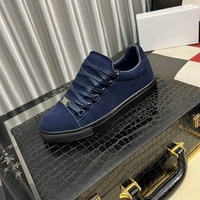 Chaussures de sport basses pour hommes Paris Trendy, style décontracté et professionnel, en cuir plissé noir, blanc, rouge, classiques pour Martin