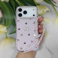 Coque de téléphone transparente à motif nœud pour iPhone 17 Pro Max 16 15 14 11, avec motif cerise mignon et dragonne perlée, pour femmes et filles