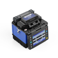 Máquina de Empalme de Fibra Óptica FTTX Orientek T49, Empalmadora Portátil con Cortadora de Fibra, Electrodo con Vida Útil de 5000 Usos