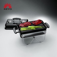 Barbecues portables de table d'extérieur au charbon de bois avec pieds pliables