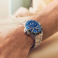 Montre de plongée pour homme en argent, cadran bleu, lunette rotative, affichage de la date, aiguilles lumineuses, bracelet en acier inoxydable, montre-bracelet sport à quartz