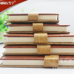 Carnet en cuir marron Xuening série 60 avec boucle, 124 pages, portable pour le bureau et les affaires - Product Image 1