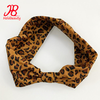 Vente en gros Bandeau personnalisé Boho imprimé léopard Bandeau de sport antidérapant pour femmes, entraînement, yoga, torsion croisée