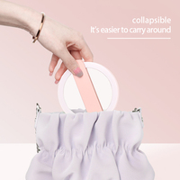 OEM Mini miroir portable de maquillage de voyage de poche à LED Miroir cosmétique de poche personnalisé à poignée compacte et pliable