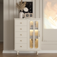 Combinaison moderne minimaliste de luxe léger pour chambre et salon : table basse et armoire en bois massif