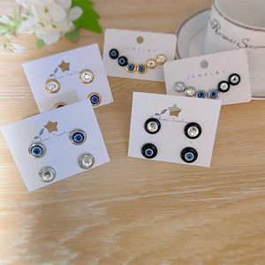 Boucles d'oreilles clous géométriques style œil porte-bonheur européen et américain, en alliage de zinc, serti clos rond, ensemble de bijoux de mode pour femme - Product Image 1
