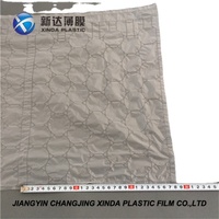 Emballage de coussin en plastique moins cher, film de coussin à bulles d'air gonflable pour la protection, emballage de remplissage pour la protection