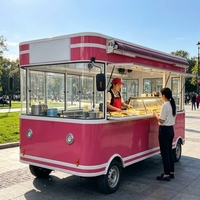 Chariot alimentaire mobile motorisé en acier inoxydable personnalisé avec compartiments isothermes, suivi GPS et alimentation intégrée pour usage commercial