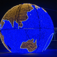 Sculpture de globe terrestre de Noël scintillante en 3D pour la décoration des hôtels et des complexes hôteliers
