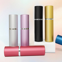 Flacon de parfum portable cylindrique en ABS de 10 ml, emballé en carton, conteneur vide pour maquillage, vente en gros personnalisée pour les boutiques en ligne américaines