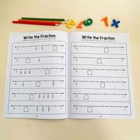 Cahier d'activités de mathématiques pour les élèves de 3e, 4e et 5e années : Améliorez vos connaissances sur les fractions et la division
