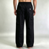 Pantalon cargo ample et épais pour homme, style streetwear, avec multiples poches, appliques et patchs, coupe droite, idéal pour le travail
