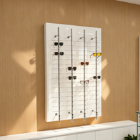 Présentoir mural personnalisé pour lunettes de soleil, présentoir optique, présentoir à lunettes verrouillable avec barres de présentation et éclairage LED