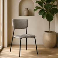Chaise de salle à manger moderne en acier carbone noir avec assise et dossier rembourrés en velours pour hôtel et mobilier de maison