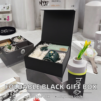Boîtes cadeaux pliables en papier noir à prix de gros avec revêtement UV, doublure en éponge, fermeture magnétique rigide et commande personnalisée acceptée