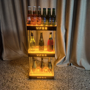 ตู้แชมเปญอะคริลิคแบบมีไฟ LED ชั้นวางไวน์สามชั้น พร้อมไฟสำหรับงานปาร์ตี้ ดีไซน์ทันสมัย รูปทรงสี่เหลี่ยมผืนผ้า สำหรับเก็บเบียร์และสุรา - Product Image 1