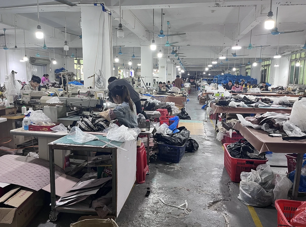 Guangzhou Qisheng Leather Goods Co., Ltd. logo
