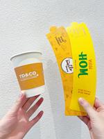 Großhandel Umweltfreundliche Einweg-Kaffeebecher-Hüllen aus Schwarzem Karton mit Individuell Bedrucktem Logo, Recycelbare Papierbecher-Hüllen