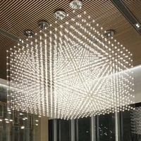 Grand lustre Firefly pour hall d'hôtel, villa, restaurant, salle modèle, avec plafond haut et lampes artistiques créatives au design original.