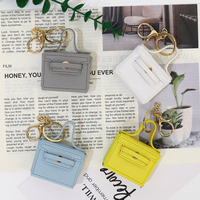 En gros Mini sac en cuir porte-clés, étui pour écouteurs, breloque de sac de luxe, petite boîte de rangement, accessoire