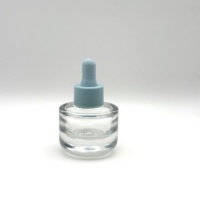 Vente en gros de bouchons compte-gouttes en plastique bleu mat 20/410 avec pipette en verre pour flacon d'huile essentielle cosmétique pour barbe