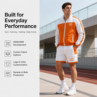 Ensemble survêtement homme grande taille imperméable personnalisé OEM, veste et short en nylon color block surdimensionné