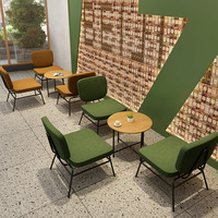 Ensemble de sièges de café commercial moderne avec banquette rembourrée, table basse ronde et chaises pour glacier