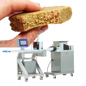 Machine de fabrication de barres d'avoine ligne de production de barres protéinées extrudeuse et découpeuse automatique de barres énergétiques à vendre
