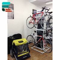 Meubles de décoration intérieure personnalisés pour magasin de vélos, présentoir mural pour magasin de vélos, présentoir de sol pour kit de cyclisme