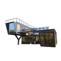 Edificio de Tiendas en Contenedores de Varios Pisos Personalizado, Cafetería Modular Prefabricada en Contenedores con Terraza en el Techo