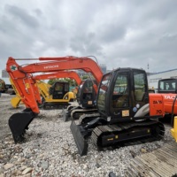 Mini-excavatrice Hitachi ZX70 d'occasion, poids opérationnel de 7 tonnes, sur chenilles, avec moteur et pompe, composants essentiels, à vendre