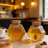 100ml/220ml/380ml 육각형 유리 꿀병 금속 밀봉 뚜껑과 나무 스푼 젓는 막대가 포함된 포장