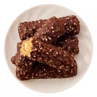 Machine automatique TUORONG pour la saupoudrage de noix et l'application uniforme de chocolat sur les snacks enrobés de chocolat et de caramel