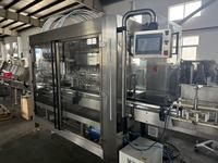 Machine de remplissage d'huile industrielle robuste pour l'automatisation de l'assemblage et du traitement sur lignes de production automatisées