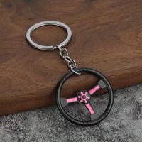 Bon stock porte-clés Turbo Vintage volant de course porte-clés en métal pour Couples imprimé UV Collection dessin animé voiture porte-clés