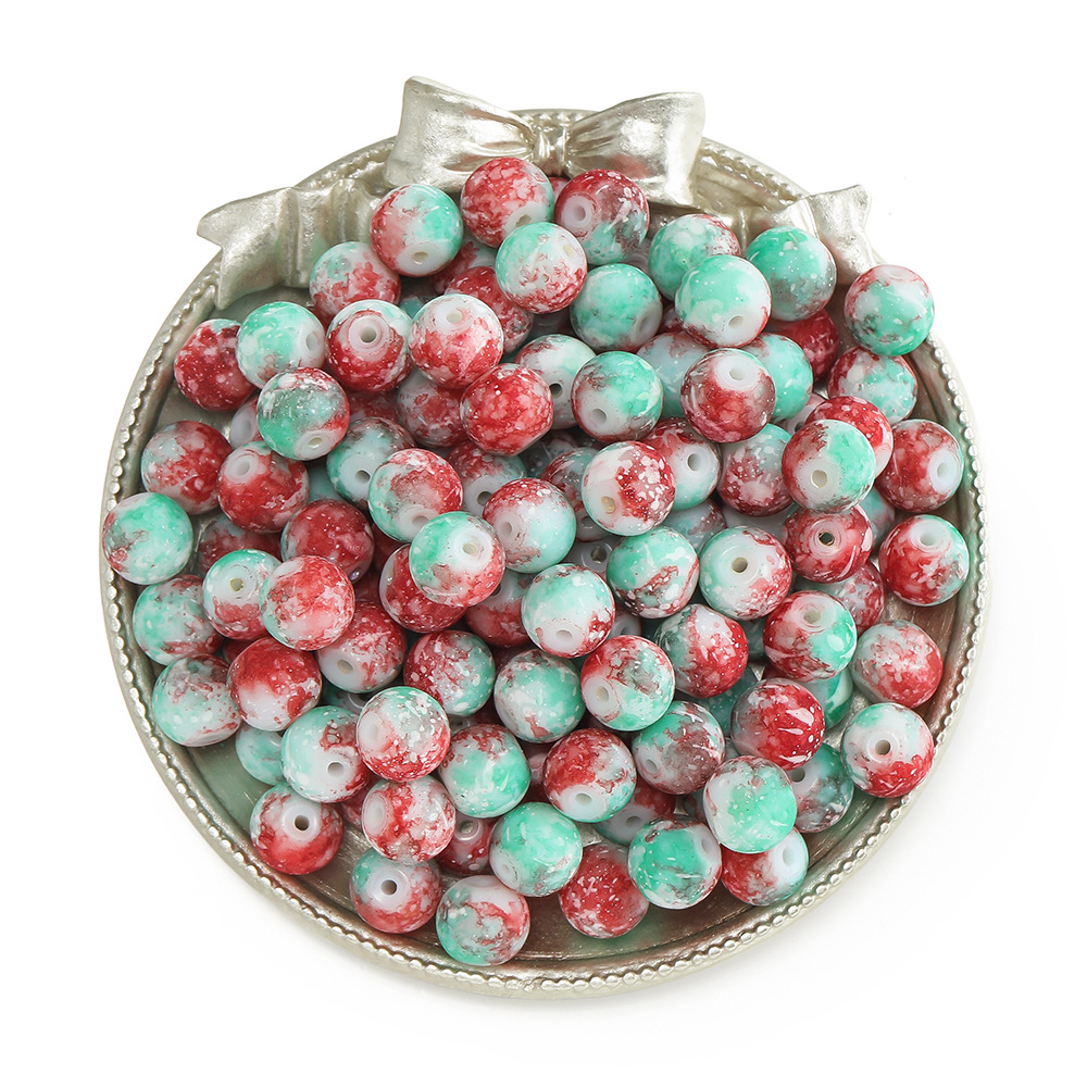 Perles en porcelaine flocon de neige - rouge et vert