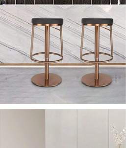 Restaurants and hotels feature modern rose gold stainless steel bar <b>stools</b> with swivel bases and <b>height</b>-<b>adjustable</b> ottoman legs - Product Image 2