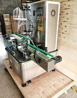 Machine de remplissage et de scellage à 6 têtes pour liquides (eau pure, huile d'olive, savon liquide pour les mains, miel) avec pompe magnétique à rotor en plastique, Dubaï
