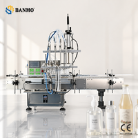 Machine de remplissage automatique BANMO à 4 têtes avec pompe magnétique et convoyeur, capacité de remplissage de liquides de 5 à 2000 ml, haute précision