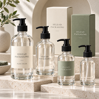 Vente en gros de flacons pompe en verre transparent Boston Round de 250 ml et 500 ml pour les marques privées de savon liquide et de gel lavant pour les mains